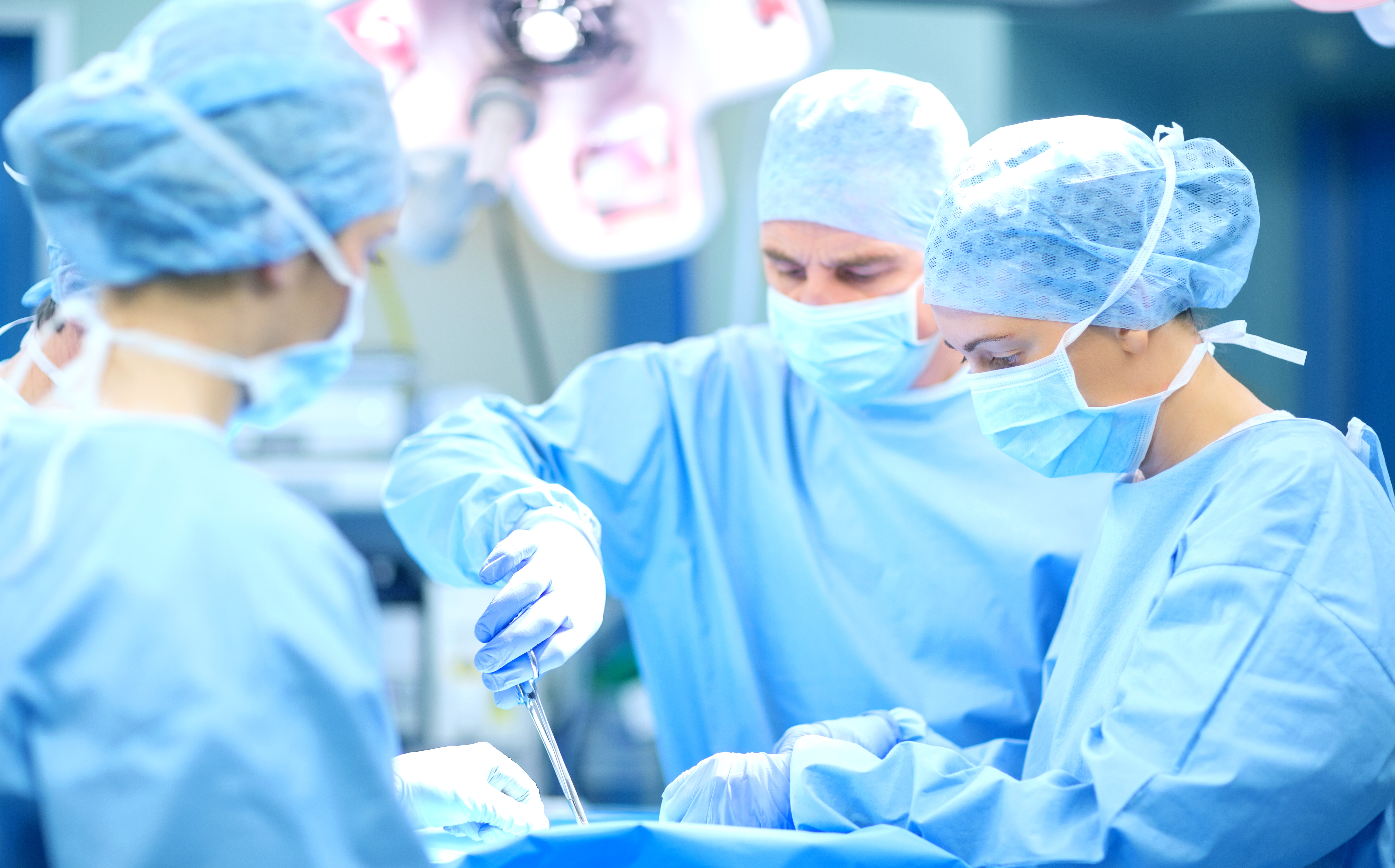 Surgical team in operating room using Newrise Medical infection control products